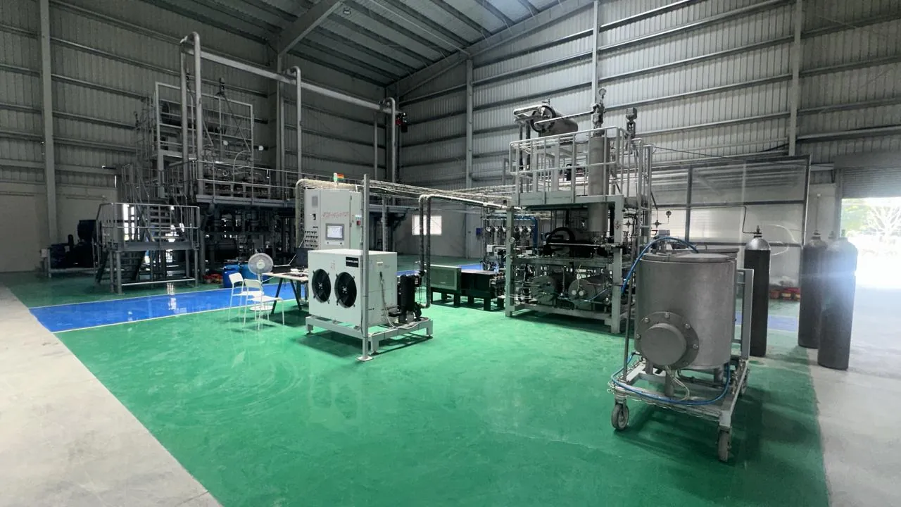 Extraction and processing equipment on the production floor, with chillers, process vessels and gas cylinders